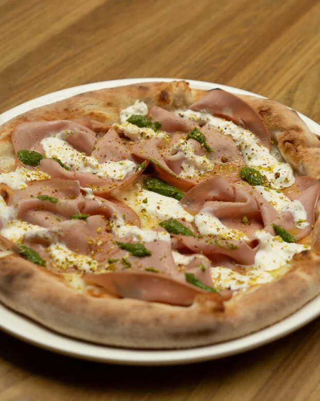 Pizza served at Ombra Modern Tavern Italian restaurant in Bangkok