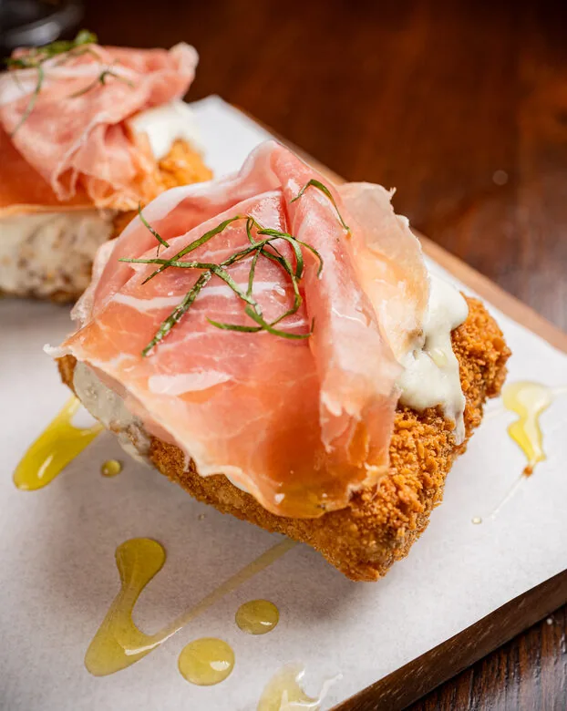 Pizzetta Parma with stracciatella, Parma ham and basil at Ombra Modern Tavern Bangkok